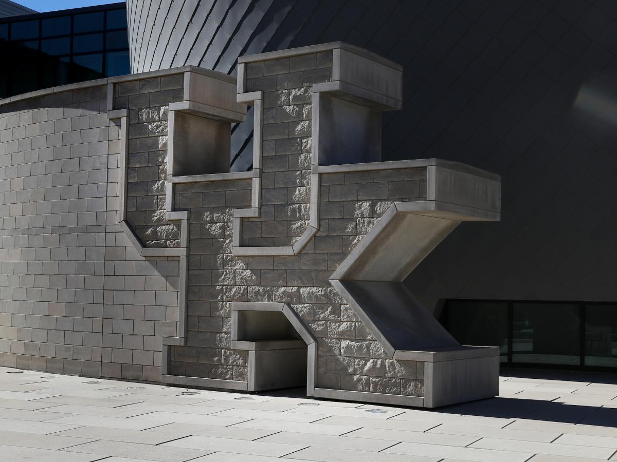 Photo of UK brick wall at the Gatton Student Center.