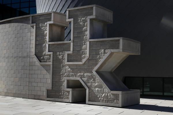 Photo of UK brick wall at the Gatton Student Center.