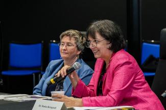 NCATS Director Joni Rutter and NIH Director Monica Bertagnolli participate in a roundtable discussion with UK investigators from the eight Research Priority Areas. 