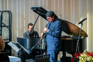 Miles Osland and Raleigh Dailey (College of Fine Arts) performing for the opening of the reception. 