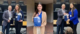 Dr. Jason Marion,  Eastern Kentucky University, announces award winners. Left to right: Outstanding Research Poster Presentation: Josiane W. Tessmann, UK. Outstanding Research Poster Presentation: Victoria Klaus, UK. People's Choice Poster Presentation: Jerika L. Durham, UK.